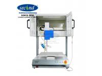 How is the Automatic Glue Dispensing Machine applied in the chip packaging industry?