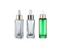 What is the Difference Between Glass Bottle Manual Production and Assembly Line Production?