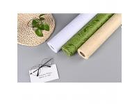 How does the durability of TNT Big Rose Embossed Non-woven Fabric compare to traditional woven fabrics?