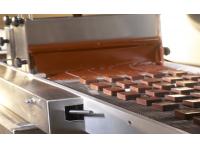 Enhance Your Confectionery Production with a Chocolate Coating Machine