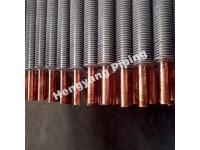 What is the purpose of the finned tube?