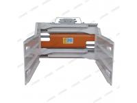 What are the advantages of using a bale clamp attachment on a forklift?