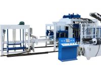 How does the automation of a concrete block machine impact construction timelines?