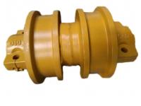 How do track roller contribute to the stability of a tracked vehicle?