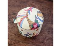 Why are metal biscuit tin boxes used for cookies and pastries?