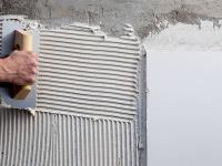 What are the raw materials for producing tile adhesive? 