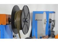 What type of clipping machine do large sausage factories use?